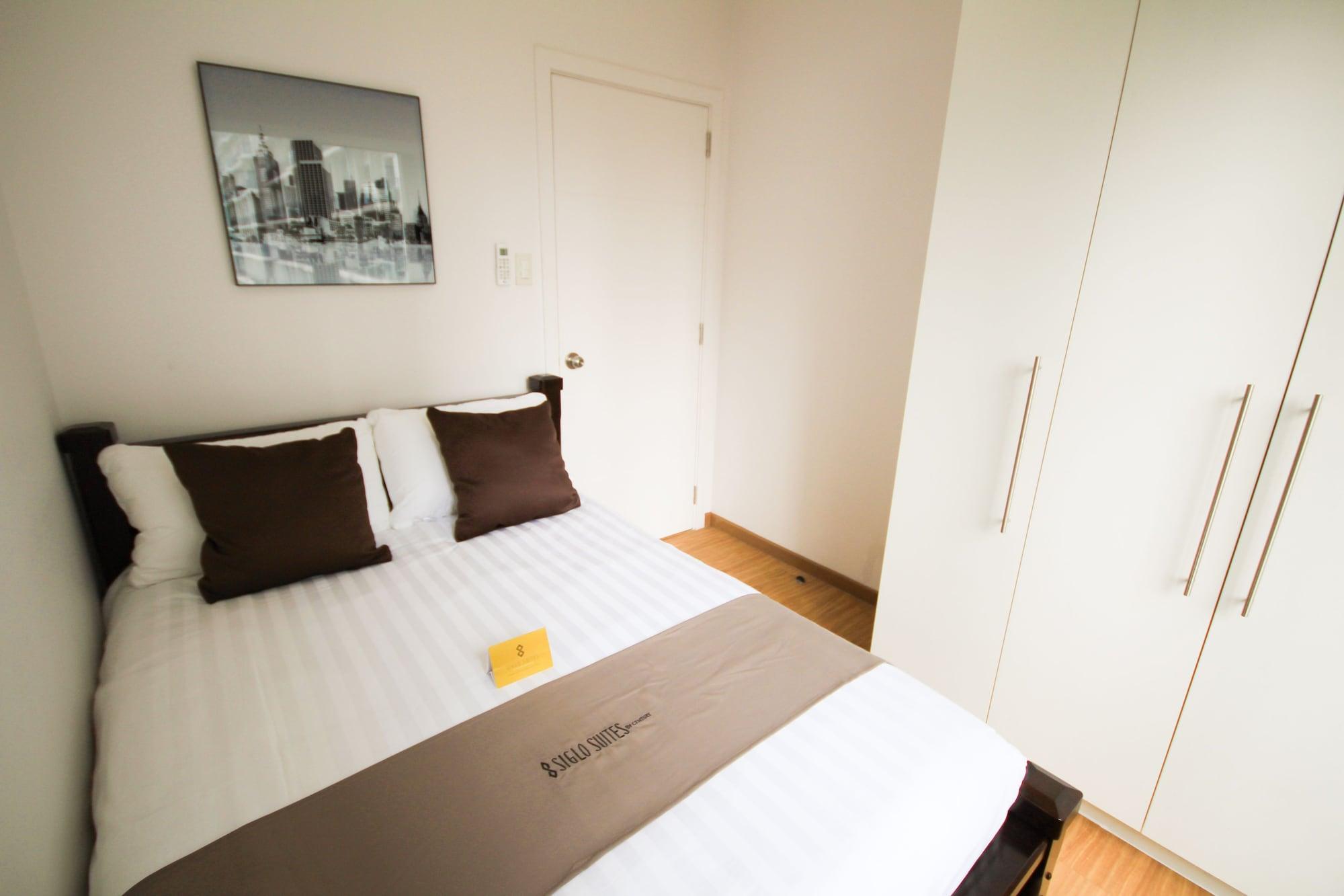 Siglo Suites @ The Acqua Private Residences Mandaluyong Extérieur photo
