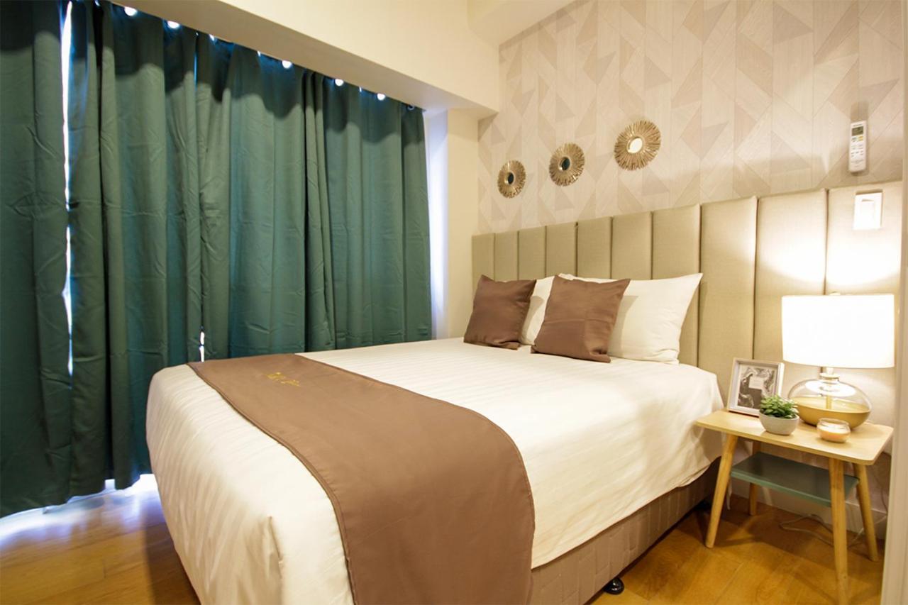 Siglo Suites @ The Acqua Private Residences Mandaluyong Extérieur photo